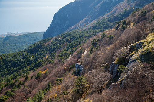 Coastal landscape of Crimean Mountains. Natural photo taken on Ai-Petri peak on a sunny day