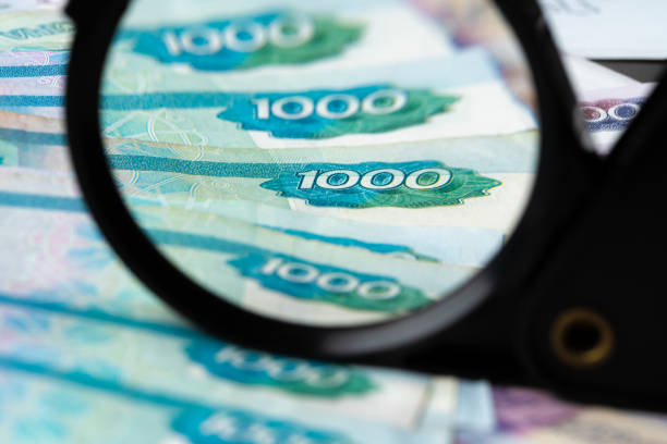 istock Magnifying Glass on the Russian Currency Rubles 1452658109