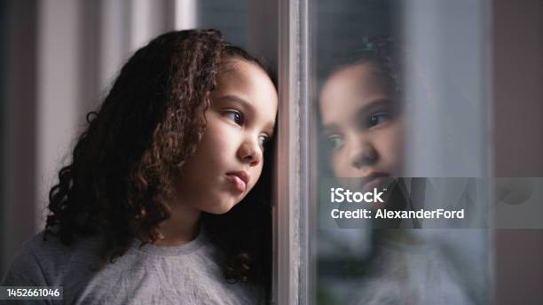 Mental Health Girl And Window For Sad Thinking And Depressed In Home Depression Black Child And Unhappy With Stress Anxiety And Frustrated With Suffering Disappointed And Foster Female Kid Stock Photo - Download Image Now