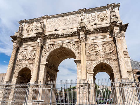 Roma, Italy. Amazing view of the Arch of Constantine or Arco di Costantino. It is a triumphal arch in Rome dedicated to the emperor Constantine. Famous touristic destination in Roma