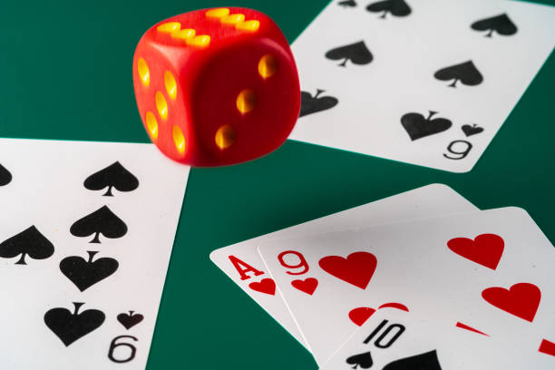 istock Playing cards with red dice. Casino and gambling concept 1452662253