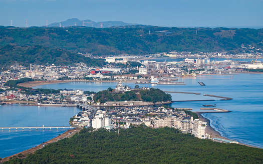 Niji-no-Matsubara (one of Japan's three major pine groves) on a sunny day in December 2022 in Karatsu City, Saga Prefecture, from the Kagamiyama observatory where the statue of Sayohime Matsuura stands.