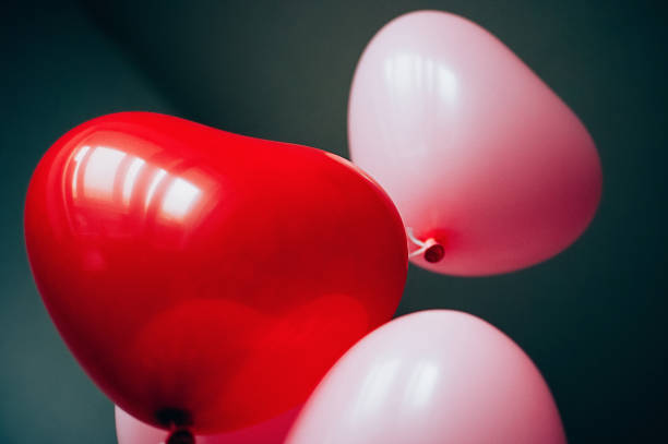 istock heart shaped pink balloons 1452663811