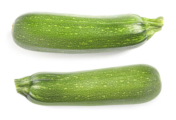 istock Fresh ripe zucchinis on white background, top view 1452666591