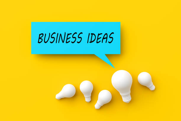 istock Light bulbs with a speech bubble with the word business ideas. Finding creative business ideas 1452666874