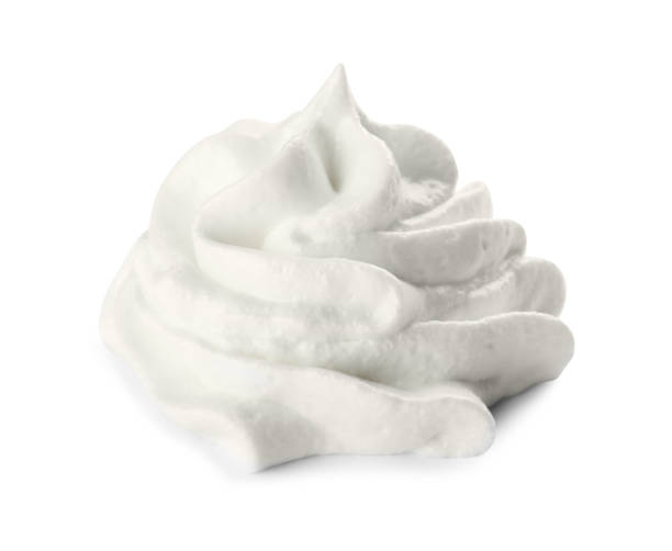 istock Delicious fresh whipped cream isolated on white 1452667250