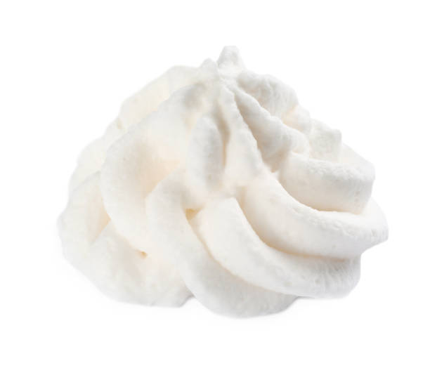 istock Delicious fresh whipped cream isolated on white 1452668204