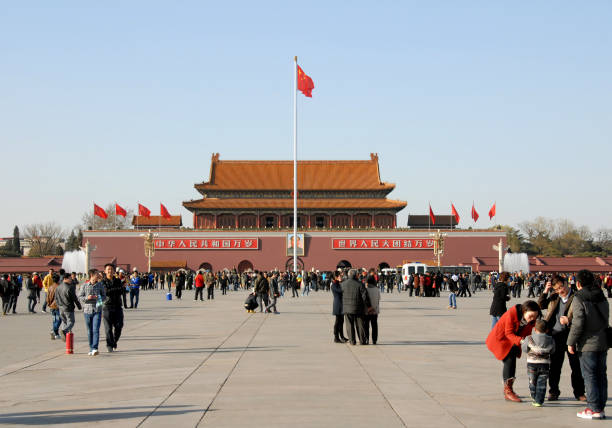 Tiananmen Square and Gate of Heavenly Peace in Beijing, China Tiananmen Square, Beijing, China and Gate of Heavenly Peace (Tian An Men). Tiananmen Square is a famous landmark in Beijing. Tiananmen leads to the Forbidden City. forbidden city beijing architecture chinese ethnicity stock pictures, royalty-free photos & images