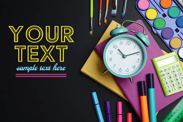 istock Flat lay composition with alarm clock and different school stationery on blackboard. Mockup for design 1452670946