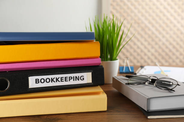 istock Folders and stationery on desk in office. Bookkeeper's workplace 1452673133