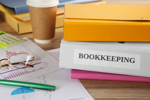 istock Folders and documents on desk in office, closeup. Bookkeeper's workplace 1452674274