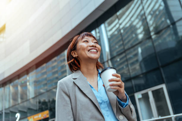 istock Young businesswoman day dreaming. 1452677724