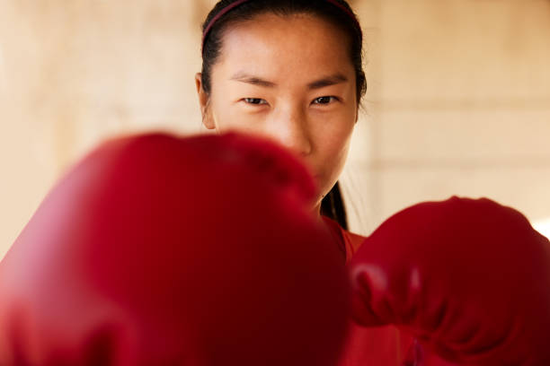istock Woman boxing sparring outdoors. 1452679200