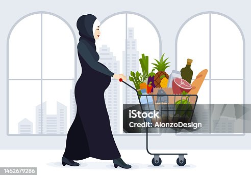 istock Pregnant Woman Shopping Groceries.  Future Muslim Mother . 1452679286