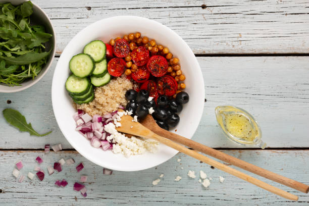 ingredients of vegetable salad with quinoa stock photo