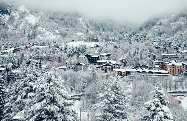 Bad weather and heavy snow in the mountains. Mountain village in winter. Snowy road. Macugnaga village (street Horlovono), Italy, an important ski resort at the foot of Monte Rosa in the Italian Alps. Macugnaga (Staffa - Pecetto) is located at 1327 m, in the Anzasca valley, province of Verbano Cusio Ossola (VCO), Piedmont