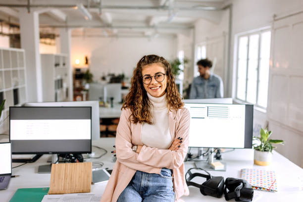 istock Young female game designer posing in the office setup 1452684626