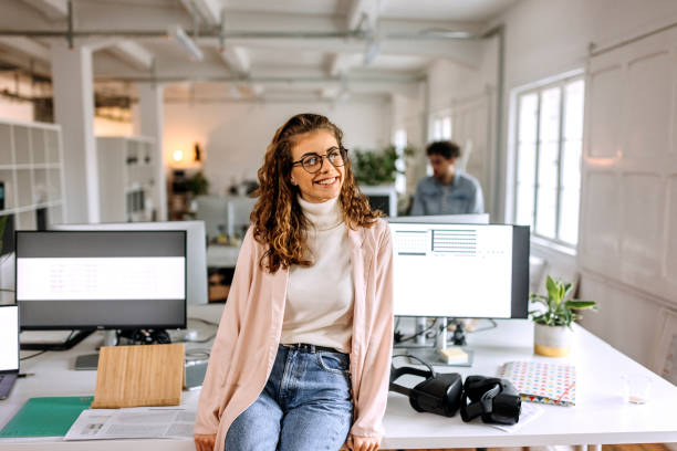 istock Young female game designer posing in the office setup 1452684663