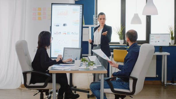 istock Business people working on project strategy at corporate meeting 1452684674