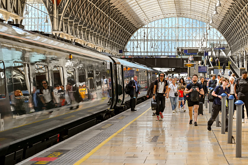 London, England, UK - June 2022: People arriving at London Paddington railway station