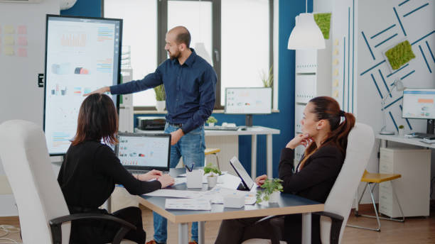 istock Colleagues at business meeting for project planning 1452685922