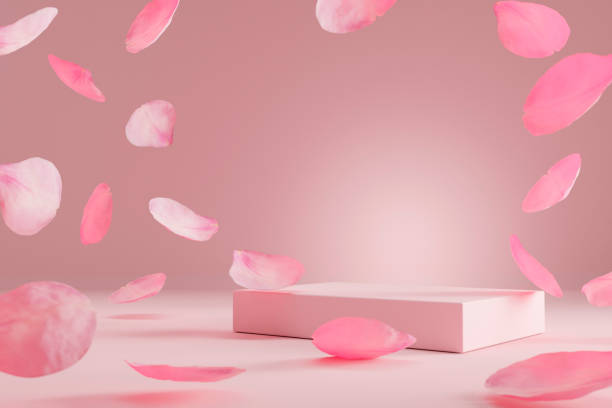 istock Pink product podium with rose petals falling. 1452687087