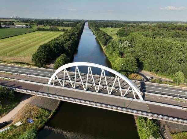 istock Bird's-eye view of an arch bridge over a river 1452687596