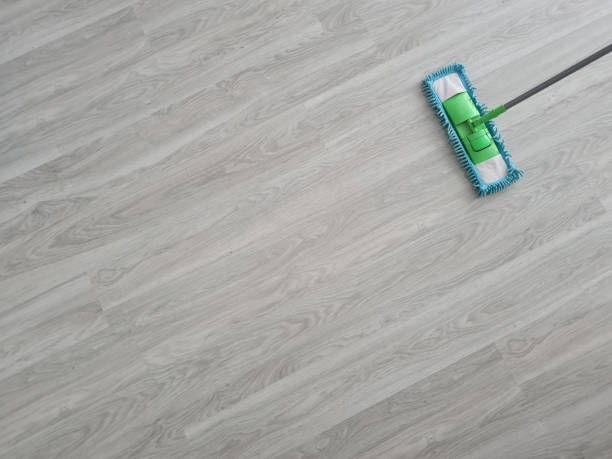 istock Plastic mop and washes dirty floor closeup 1452688939