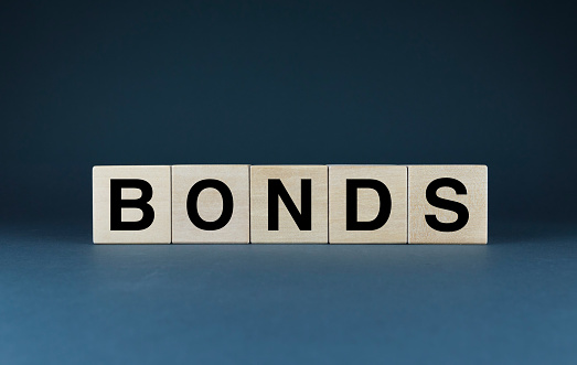 Bonds. Cubes form the word Bonds. Bonds word concept - finance, market and investment