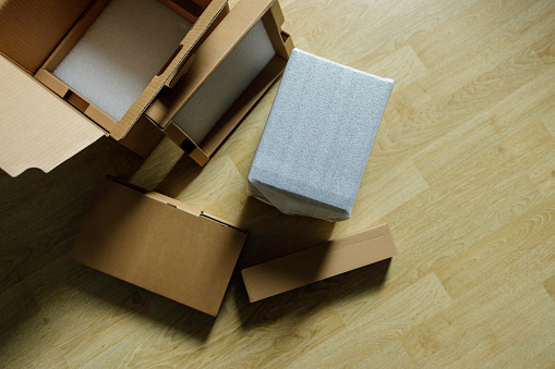 unpacking a cardboard box