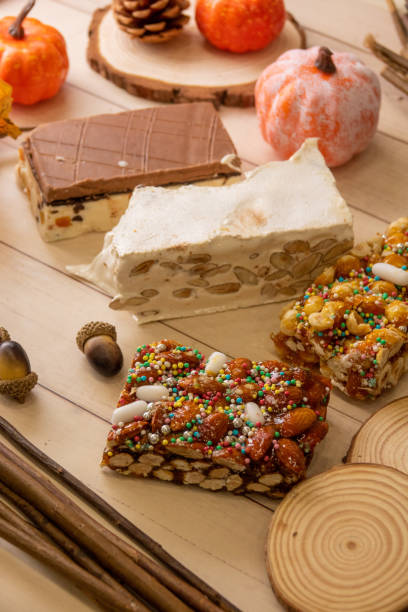 istock Artisan nougat with white chocolate and dark chocolate on autumn decorations 1452692970