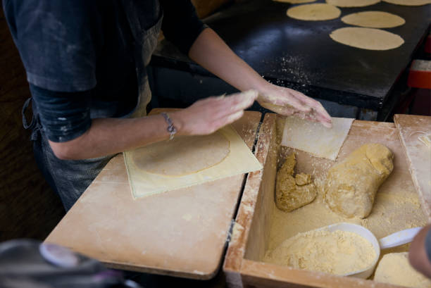 istock Farmer making Talos in Santo Tomas Fair. San Sebastian, Spain. 1452695899