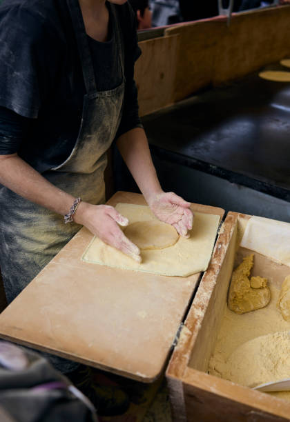 istock Farmer making Talos in Santo Tomas Fair. San Sebastian, Spain. 1452695901