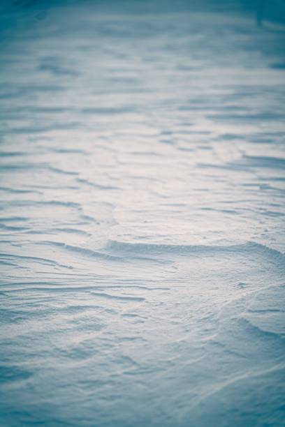 istock Beautiful texture of layers of snow 1452696037