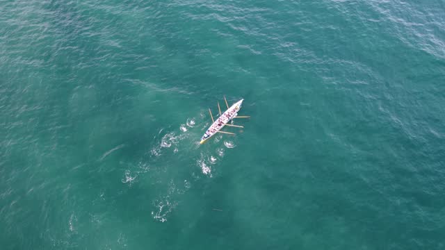 Torbay, Devon, England: Drone aerial view of a gig rowing training session