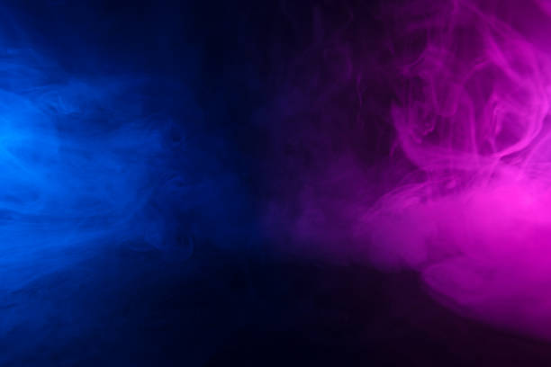 istock Colorful clouds of smoke in neon light 1452699185