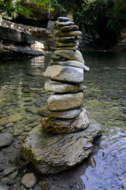 istock Vertical shot of rocks stacked by the river 1452700091