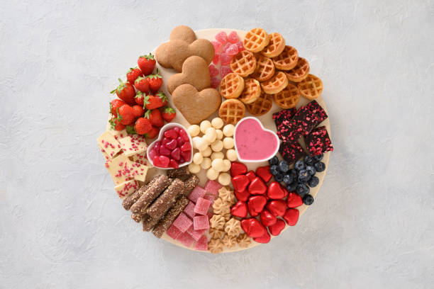 istock Charcuterie Valentines Day board with chocolate sweets. 1452703356
