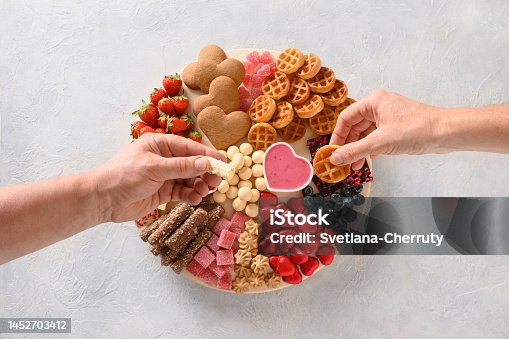 istock Charcuterie Valentines Day board with chocolate sweets. 1452703412