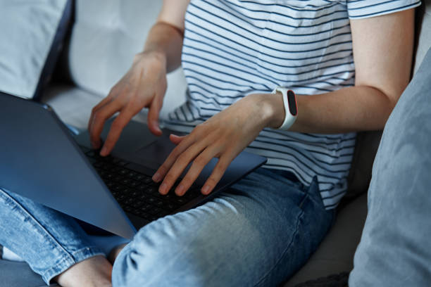 istock Woman at home using laptop. Remote work at home office 1452705307
