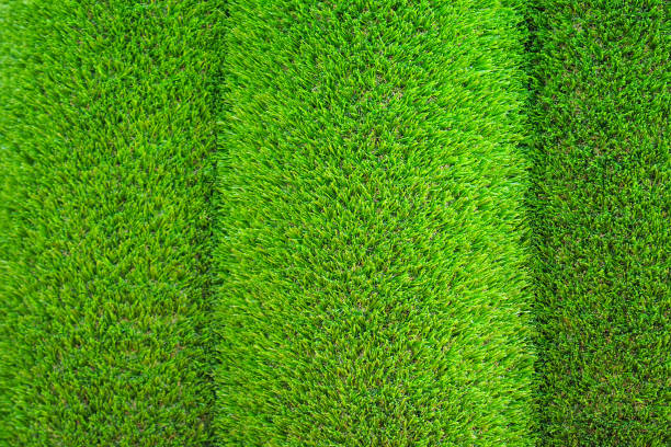 Green decorations of artificial grass, green background, texture