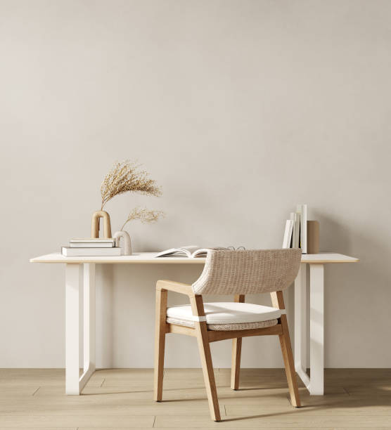 istock Elegant light beige home office interior with armchair and empty wall, 3d rendering 1452713827