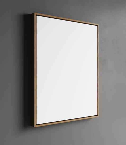 istock blank frame on gray wall mock up, vertical wooden poster frame on wall, picture frame isolated on a wall, mock up for picture or photo frame, empty frame on plaster wall, 3d render 1452713853