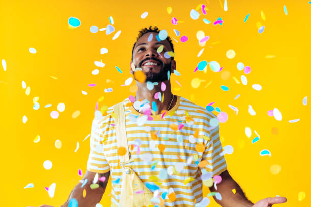 istock Man posing on colored backgrounds in studio wearing trendy clothes 1452720498