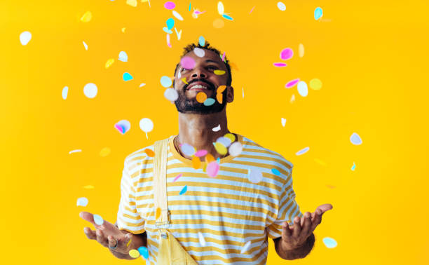 istock Man posing on colored backgrounds in studio wearing trendy clothes 1452720924