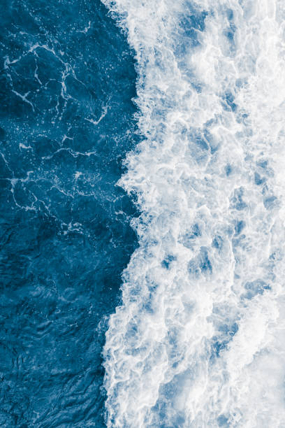 istock Dark blue sea ocean wave and  liquid white foam 1452721063