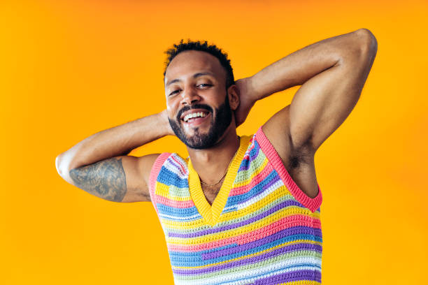 istock Man posing on colored backgrounds in studio wearing trendy clothes 1452721137