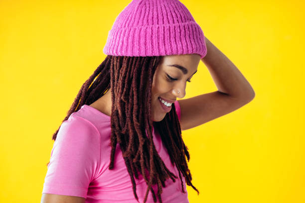 istock Woman posing on colored backgrounds in studio wearing trendy clothes 1452722542