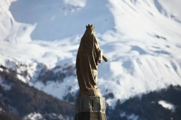 At the top of the bell tower of Jausiers, this Virgin dominates the village and looks towards the south-east towards the Col de la Bonette