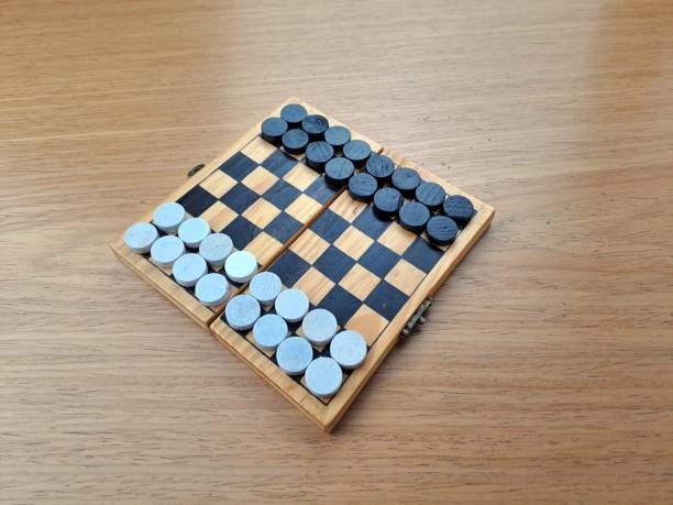 istock Checkerboard with checkers - Business strategy planning 1452724124
